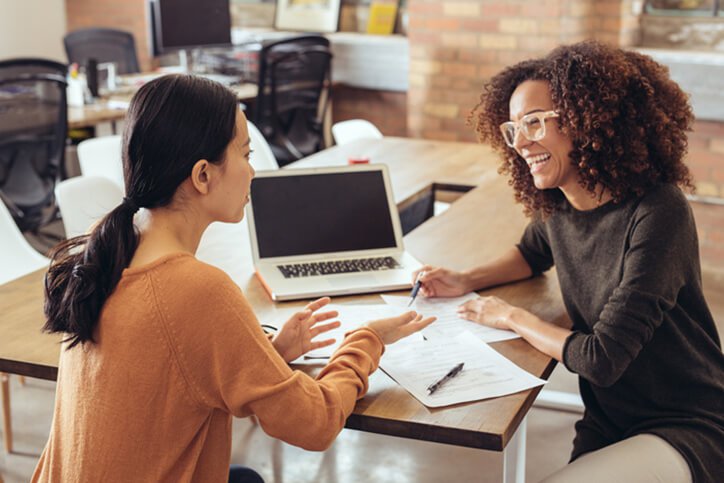 women meeting at office - dallas texas best professional real estate investor training
